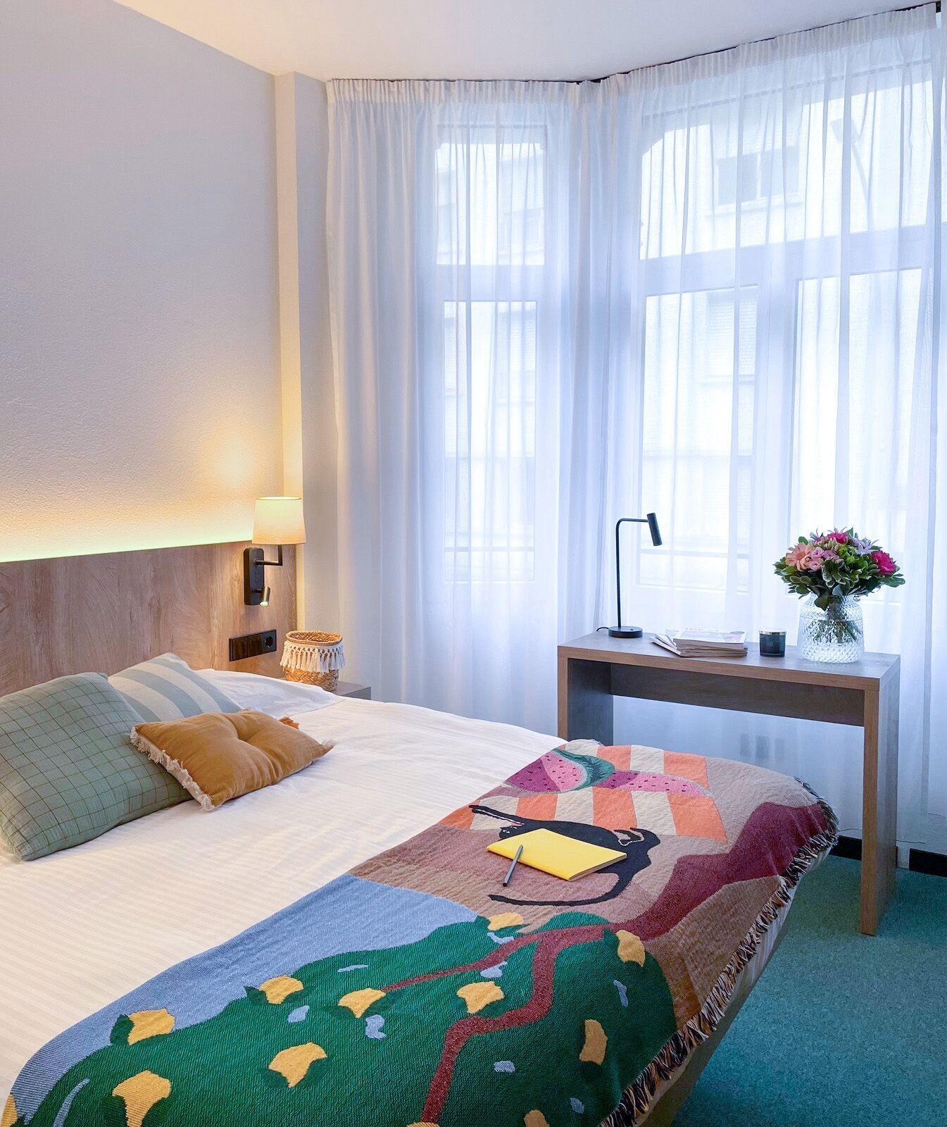 Premium bedding, desk, laptop workspace, free WiFi
