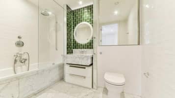 Apartment, 1 Queen Bed with Sofa bed | Bathroom | Separate bathtub and shower, deep-soaking bathtub, towels