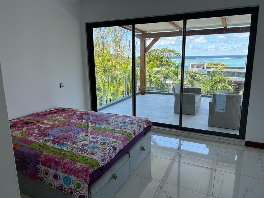 Image showcasing Penthouse sea view and access, 266m2 and private Roof Top - Blue Bay | Vrbo