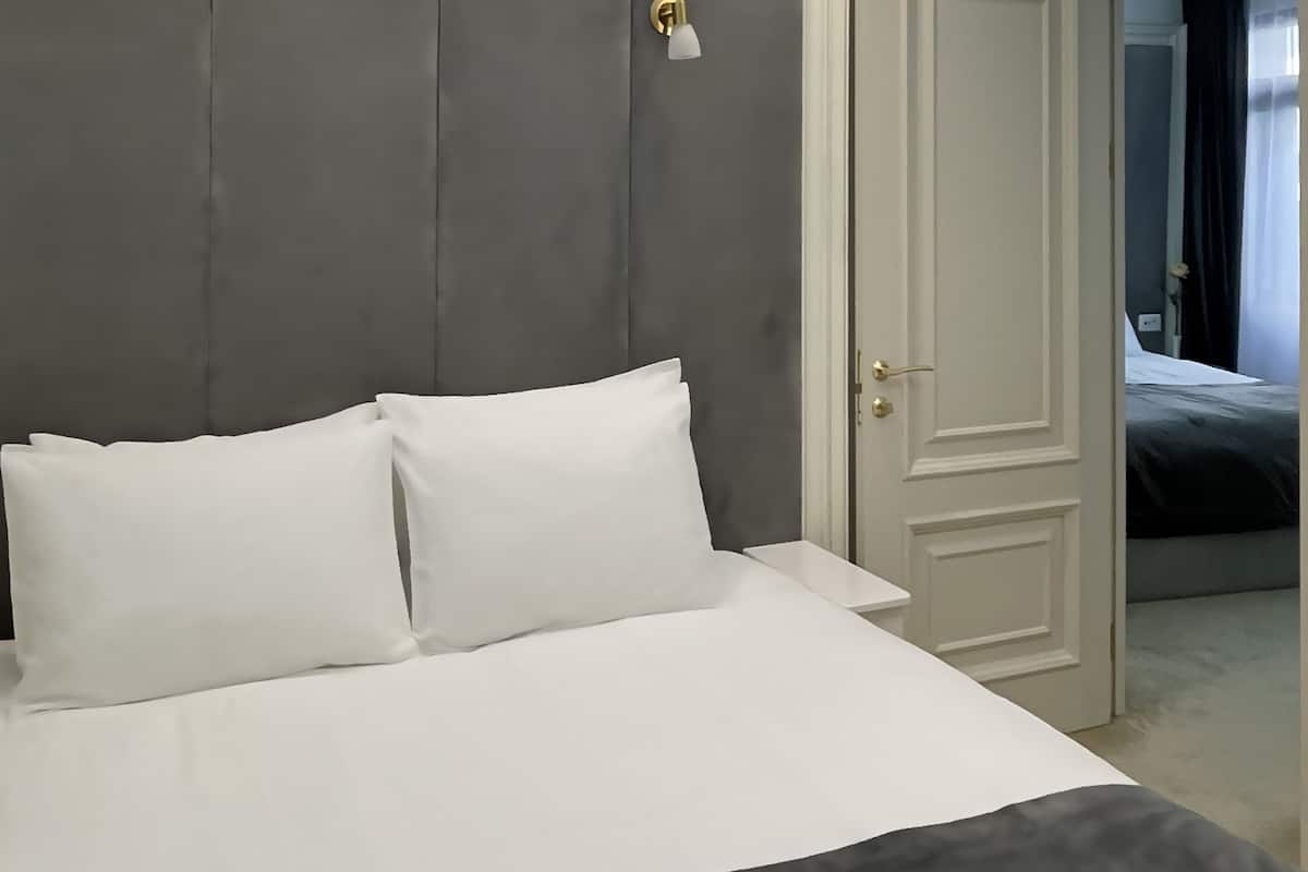 Family Room, 2 Bedrooms, Non Smoking | Premium bedding, minibar, in-room safe, individually decorated