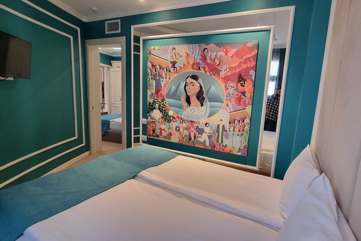Family Room, 2 Bedrooms, Non Smoking | Premium bedding, minibar, in-room safe, individually decorated