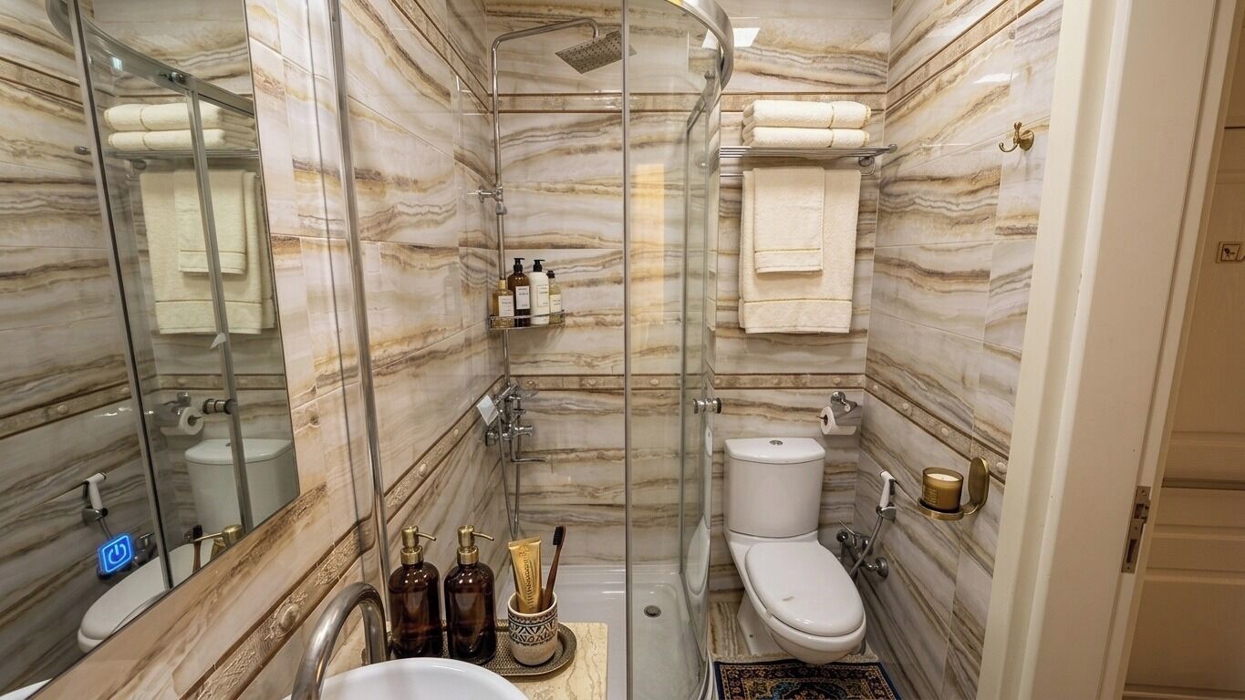 Shower, rainfall showerhead, free toiletries, hair dryer