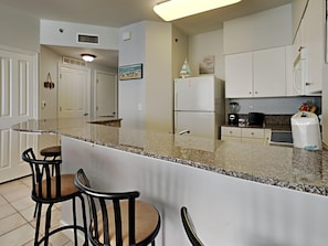 Fridge, microwave, oven, stovetop - Shores of Panama #1423 | Beachfront, Gym, Pool! (Panama City Beach)