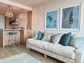 Design Apartment | Living area | 52-inch Smart TV with cable channels, TV