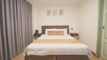 Cortinas blackout, wifi gratis y ropa de cama 