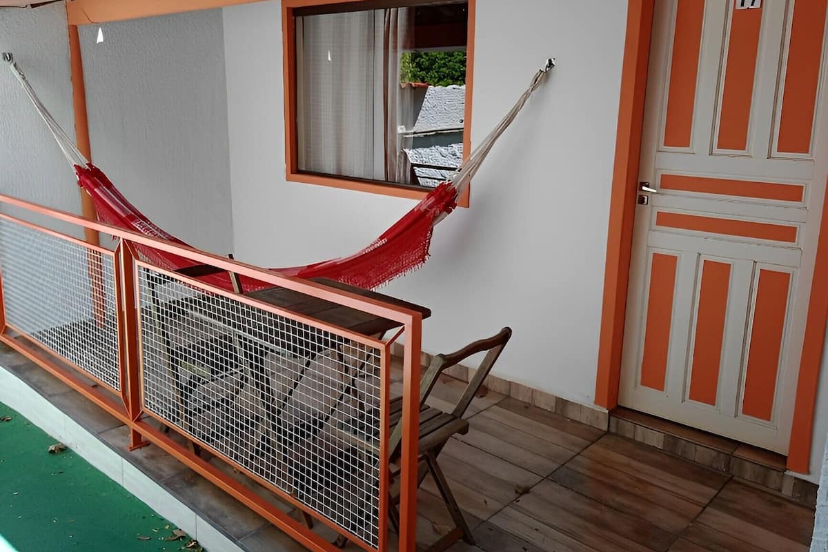 Standard Room, Multiple Beds, Balcony, Ground Floor | Minibar, free rollaway beds, bed sheets