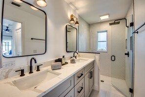 Shower, rainfall showerhead, hair dryer, towels