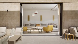 A modern living room with a sofa set, yellow armchairs, and a coffee table. - PEPE, luxury and modern villa with private pool (5 bdrms/10 guests) (Marrakech)
