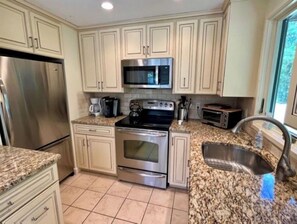 Fridge, microwave, oven, stovetop - Spacious Retreat. Close to beach & bike trails.  AC, deck & outdoor shower (West Tisbury)