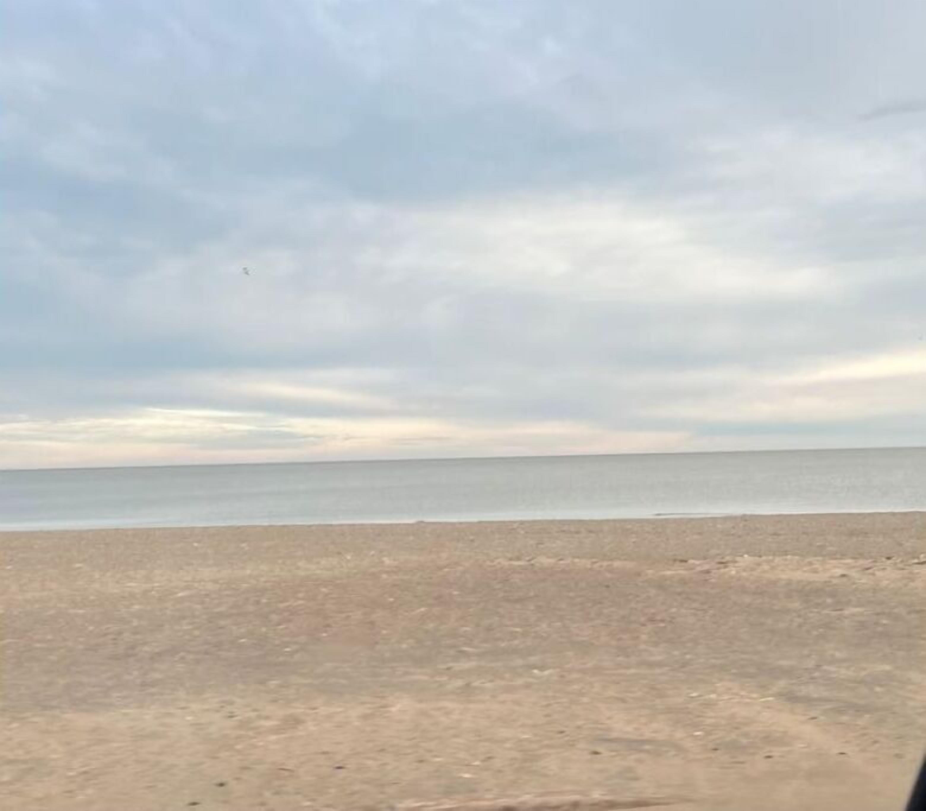 Ligstoelen aan het strand, strandlakens