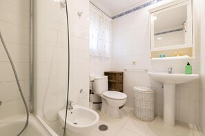 Hair dryer, bidet, towels, soap