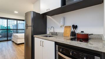 Studio | Private kitchen | Full-size fridge, microwave, coffee/tea maker, cookware/dishes/utensils