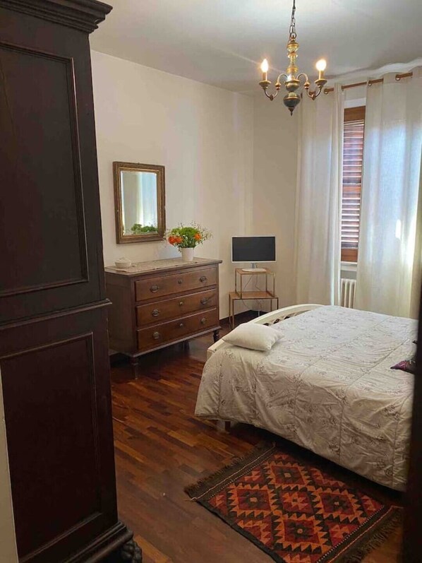 1 bedroom, desk, iron/ironing board, travel crib