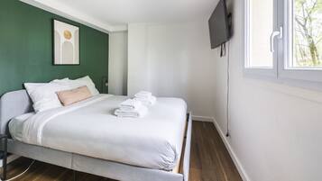 2 slaapkamers, een strijkplank/strijkijzer, reisbedje, wifi
