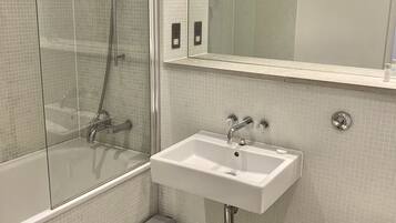 Eco-friendly toiletries, hair dryer, towels
