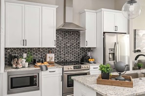 Fridge, microwave, oven, stovetop - 2 Luxe New Homes • Side-by-Side • Sleep 24 (Nashville)