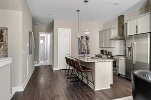 Fridge, microwave, oven, stovetop - 2 Luxe New Homes • Side-by-Side • Sleep 24 (Nashville)