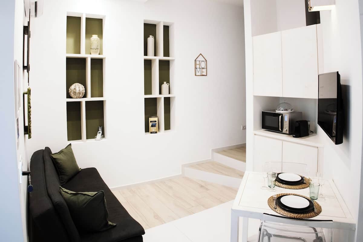 Comfort Townhome, Ground Floor 2 | 1 quarto, edredons de pluma, cofres nos quartos