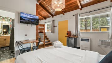 Family Room | Laptop workspace, blackout drapes, iron/ironing board, free WiFi