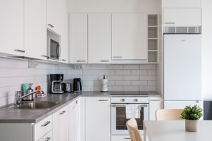 Standard Apartment, 1 Bedroom, Balcony | Private kitchen | Full-sized fridge, microwave, oven, stovetop