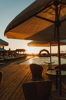 Outdoor pool, open 8:30 AM to 8:00 PM, pool umbrellas, sun loungers