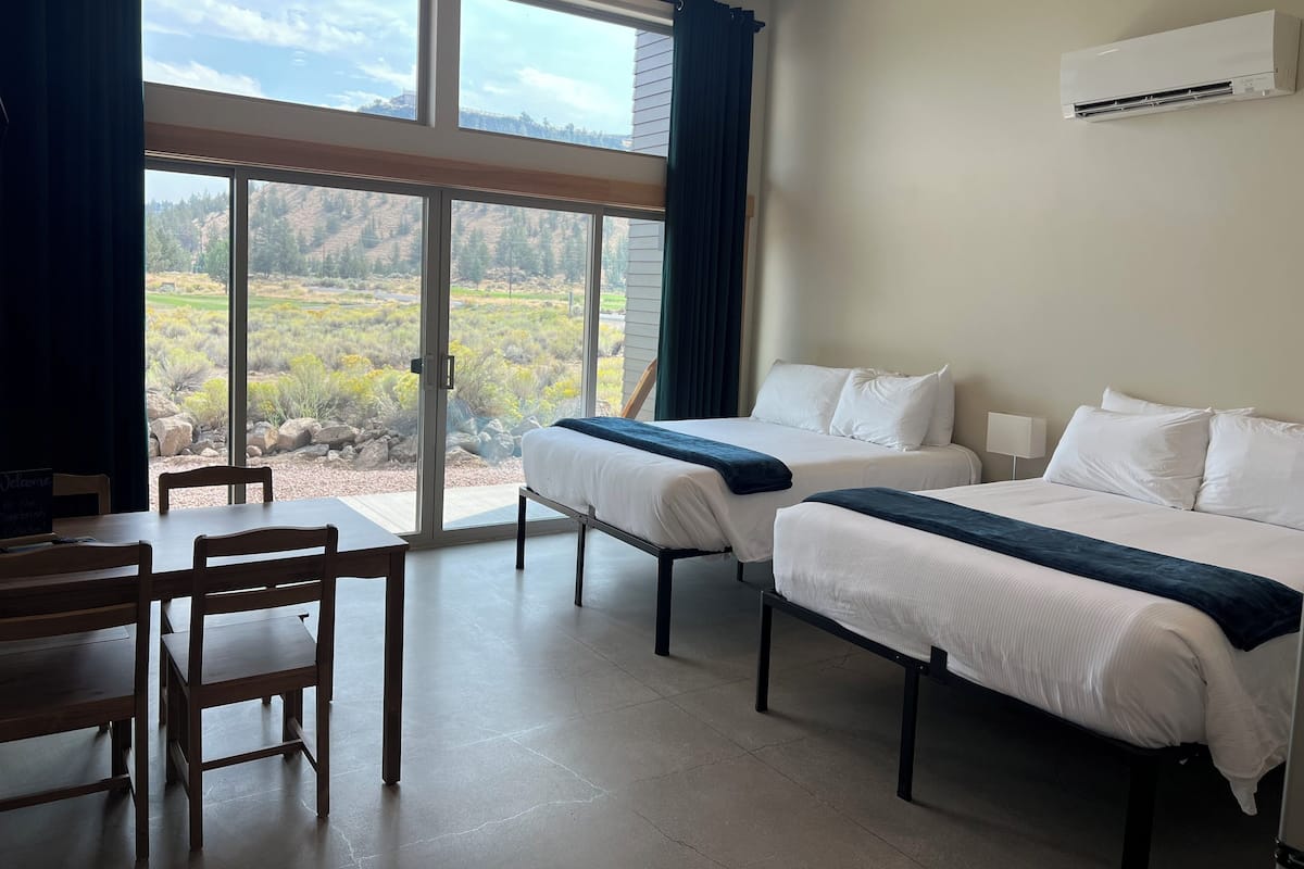 Premium Cabin | Living area | 42-inch Smart TV with cable channels, TV, streaming services