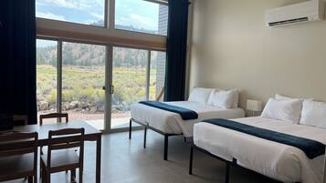 Premium Cabin | Living area | 42-inch Smart TV with cable channels, TV, streaming services