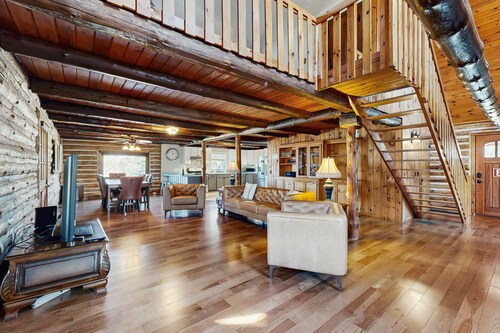 Relaxing dog-friendly water-view cabin with firepit, deck, grill, & full kitchen