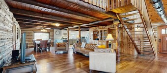 Relaxing dog-friendly water-view cabin with firepit, deck, grill, & full kitchen