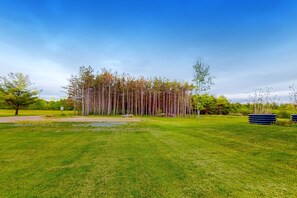 Property grounds - Relaxing dog-friendly water-view cabin with firepit, deck, grill, & full kitchen (Rock Stream)