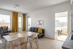 Family Apartment, 2 Bedrooms, Balcony | Living area | 40-inch flat-screen TV with cable channels, TV