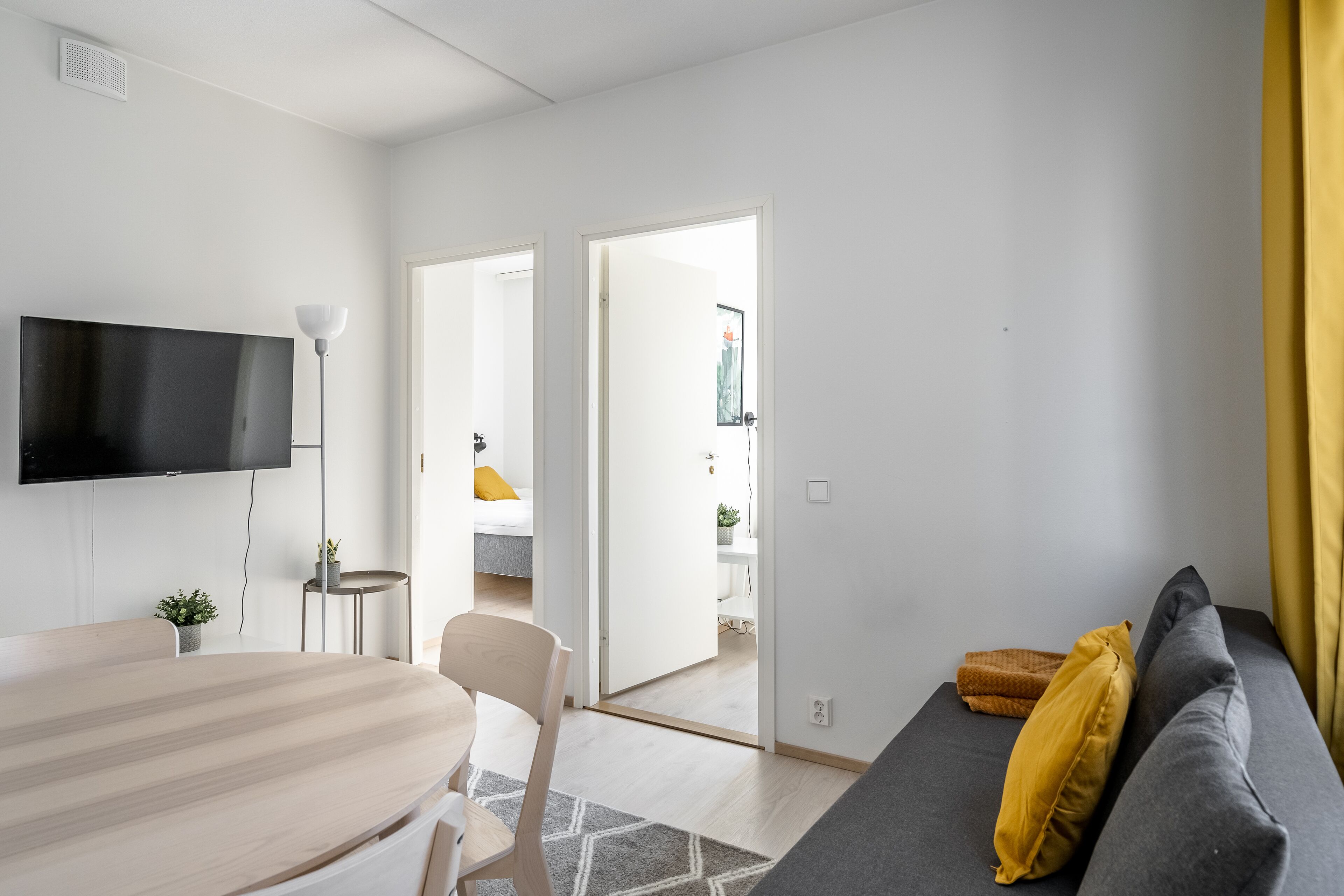 Appartement Standard, 2 chambres | Coin séjour | Télévision à écran plat de 40 pouces avec chaînes par câble, télévision