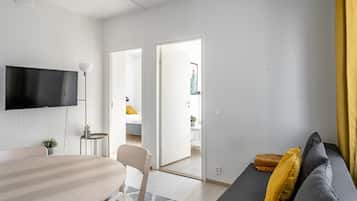Appartement Standard, 2 chambres | Coin séjour | Télévision à écran plat de 40 pouces avec chaînes par câble, télévision