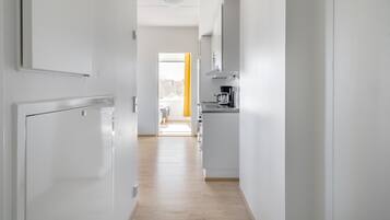 Desk, blackout curtains, soundproofing, iron/ironing board