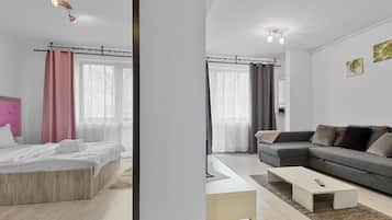 Departamento familiar | 1 habitación, escritorio, wifi gratis y ropa de cama