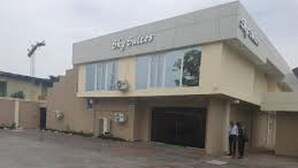 A building with a sign that reads "Big Sales." - Sky Suites Ikeja (Lagos)
