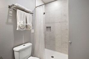 Jetted tub, hair dryer, towels, soap