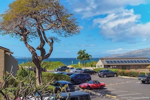 Guests can park their vehicles in the adjacent lot with ocean views.