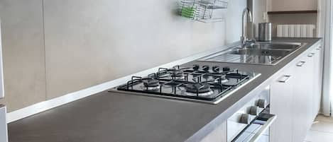 Fridge, oven, dishwasher, dining tables