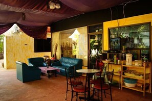Outdoor dining - Eden Hostel (Phuket)
