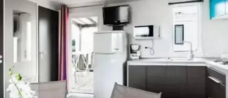 Fridge, microwave, coffee/tea maker, high chair