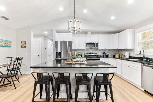 Fridge, coffee/tea maker, highchair, cookware/dishes/utensils - 257 San Marco · Brand New Bungalow | King Bed Suites | St Aug (St. Augustine)