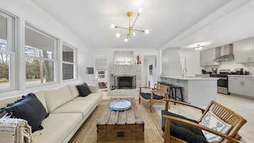 Smart TV, fireplace, books, music library