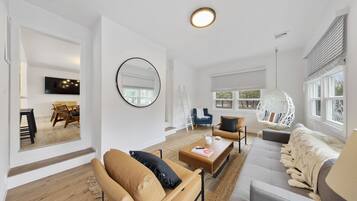 Smart TV, fireplace, books, music library