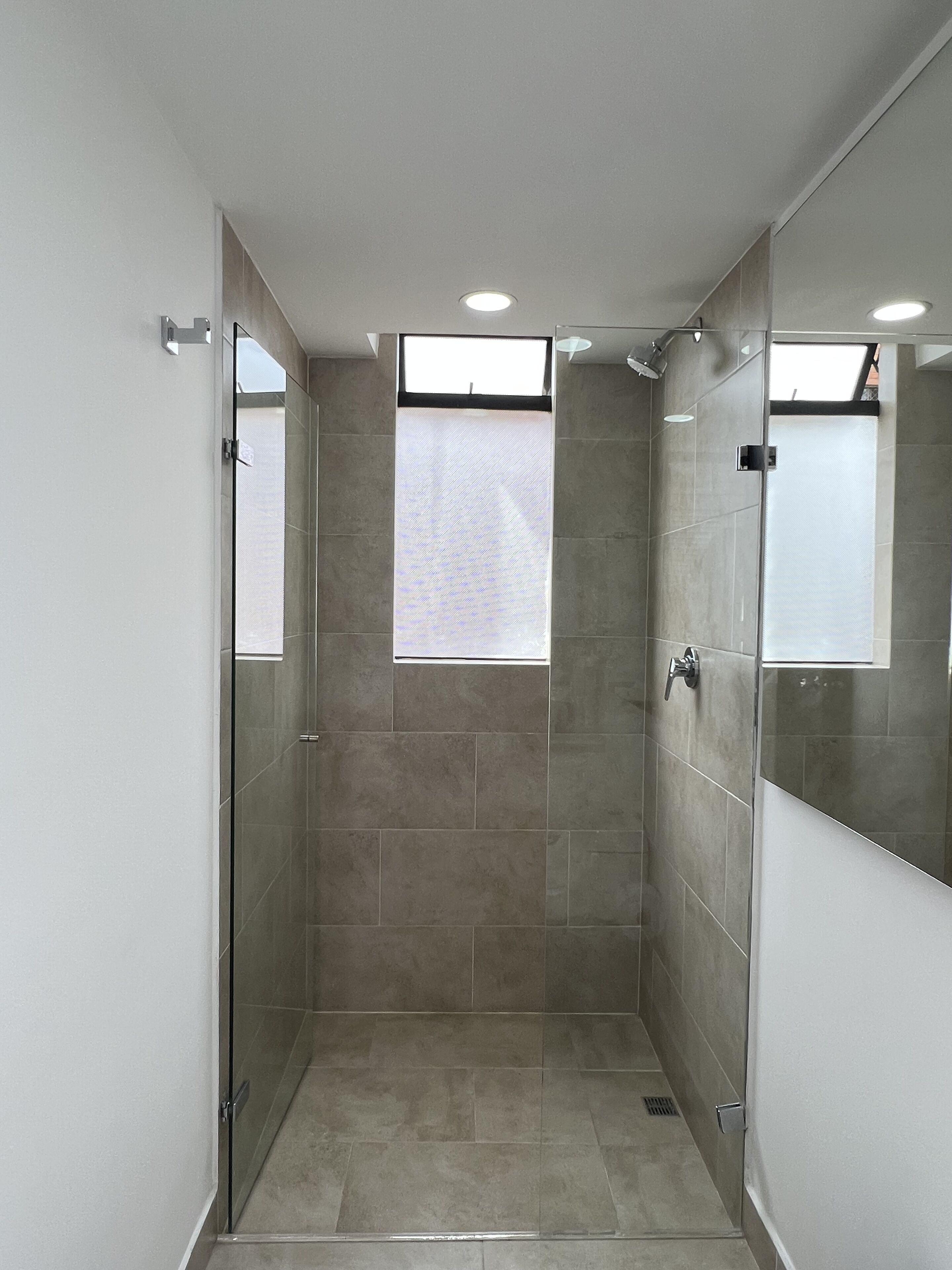 Dusj, håndklær og såpe