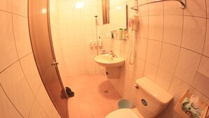 A bathroom with a toilet, sink, and shower. - Jiufen Cafe Sleep B&B No.1 Rain House (New Taipei City)