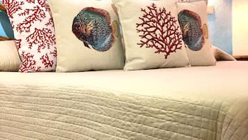 2 dormitorios, tabla de planchar con plancha, cuna de viaje