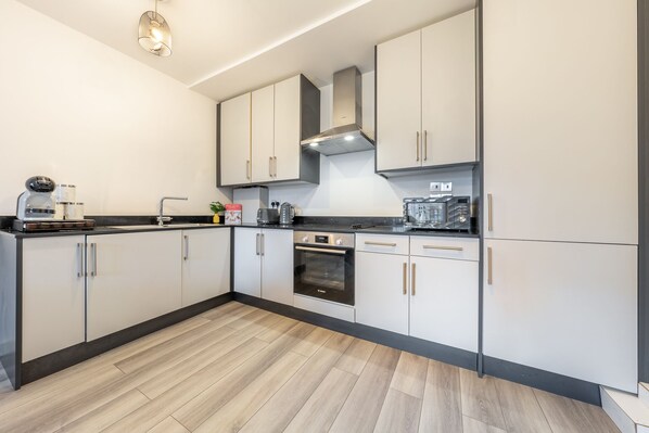 Departamento empresarial, baño privado (Garden View) | Cocina compartida