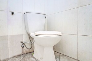 Habitación doble | Baño | Regadera y toallas 