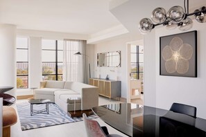 Presidential Suite, 1 Bedroom, Accessible (Roll-In Shower) | Living area | 65-inch Smart TV with satellite channels, TV - The Godfrey Detroit, Curio Collection By Hilton (Detroit)